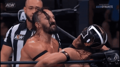 Wrestler With AEW Logo Wrestling Another Wrestler GIF