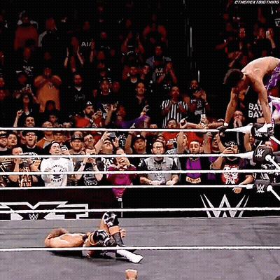 Wrestler With Bay Bay On Back GIF
