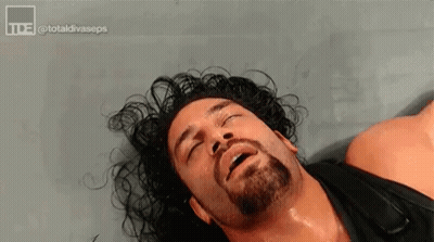 Wrestler With Beard Lying Down GIF