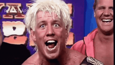 Wrestler With Blonde Hair Laughing GIF