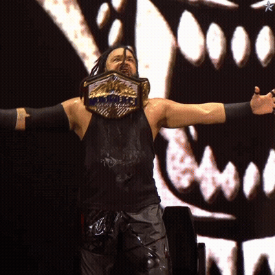 Wrestler With Intercontinental Champion Belt GIF