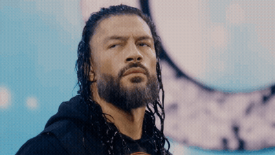 Wrestler With Long Hair And Beard On Stage GIF