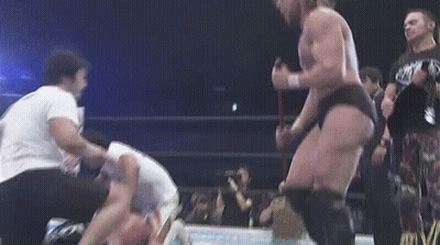 Wrestler With Rope Around Waist In Wrestling Ring GIF