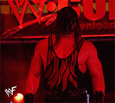 Wrestler With Sign Saying W GIF