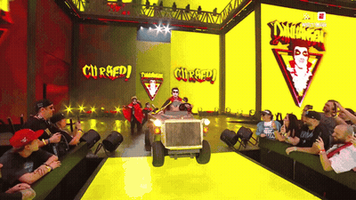 Wrestler With White Face And Red Cape GIF