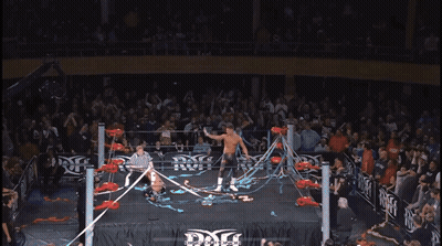 Wrestler Without Shirt Waving Hand GIF