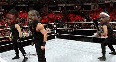 Wrestlers Dancing In Ring With USA Logo GIF