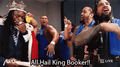 Wrestlers In Locker Room One Wearing Crown And Tie GIF