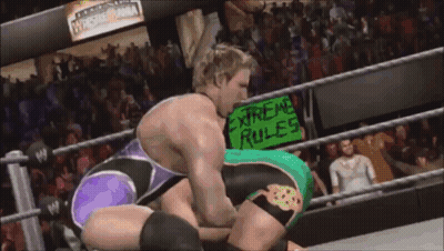 Wrestlers In Ring With Extreme Rules Sign GIF