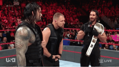 Wrestlers In Ring With World Heavyweight Championship Belt GIF