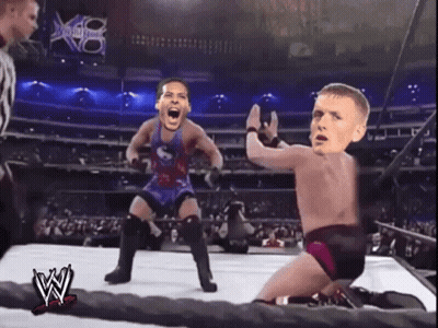 Wrestlers In Wrestling Ring With W Logo GIF
