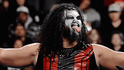 Wrestlers Standing In Front Of Solo Bikoa Banner GIF