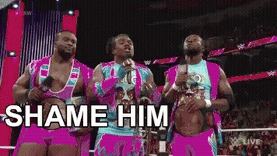 Wrestlers Standing Shame Him GIF