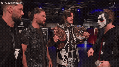 Wrestlers Standing Together GIF