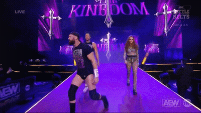 Wrestlers Walking Down Purple Ramp GIF