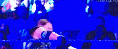 Wrestling Match In Ring With Crowd GIF