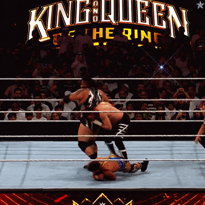 Wrestling Match Under King Queen Sign GIF