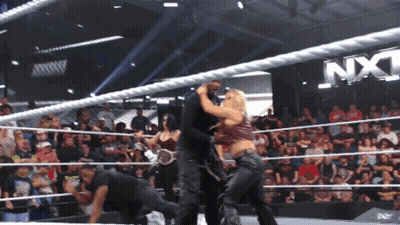 Wrestling Match Under NXT Banner GIF