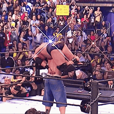 Wrestling Ring Man Holding We Love You Sign GIF