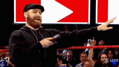 Wrestling Ring Man Pointing To Crowd With Microphone GIF