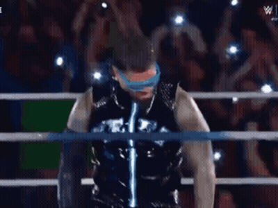Wrestling Ring Man With Sunglasses and Black Jacket