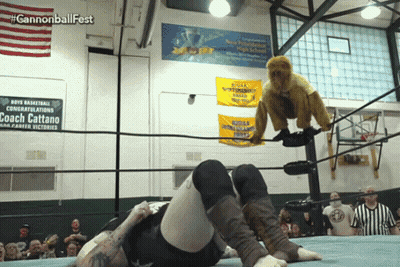 Wrestling Ring With Coach Cattano Sign GIF