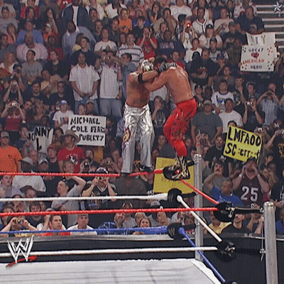 Wrestling Ring With Michael Cole Fire Sign GIF