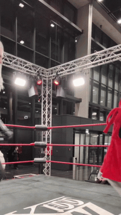 Wrestling Ring With Red Ring And USF Sign GIF