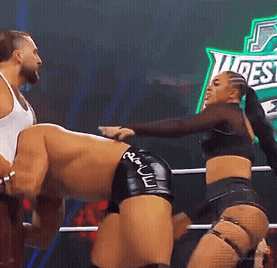 Wrestling Woman Holding Man's Butt GIF