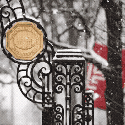 Wrought Iron Fence With Duke University Philadelphia Sign GIF