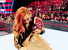 WWE Becky Lynch Throwing Money Bags GIF