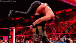 WWE Braun Strowman Body Slam Seth Rollins GIF