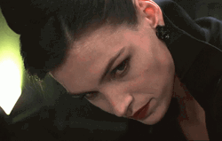 Xenia Onatopp Looking Up GIF