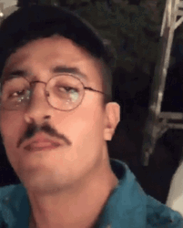 Yazid Moistening Mustache With Saliva GIF