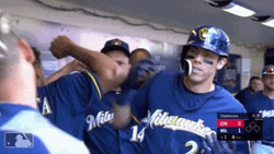 Yelich Hugs Teammate GIF
