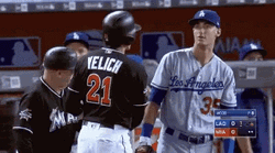 Yelich Talking With Teammate GIF