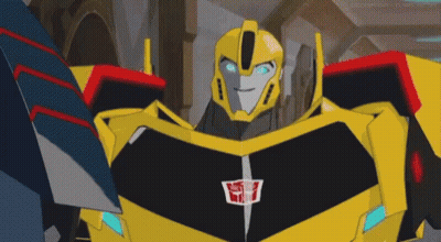 Yellow And Black Robot With Blue Eyes And Transformer Logo GIF
