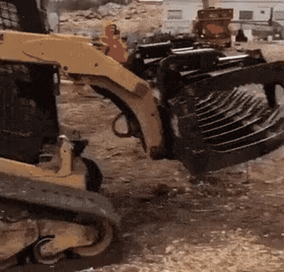 Yellow And Black Tractor With Large Scoop GIF