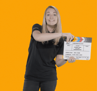 Yellow And Black Train On Tracks Near Lake GIF