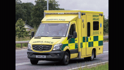 Yellow And Green Ambulance Saying Emergency GIF