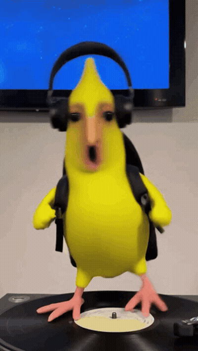 Yellow Bird Wearing Headphones On Record Player GIF