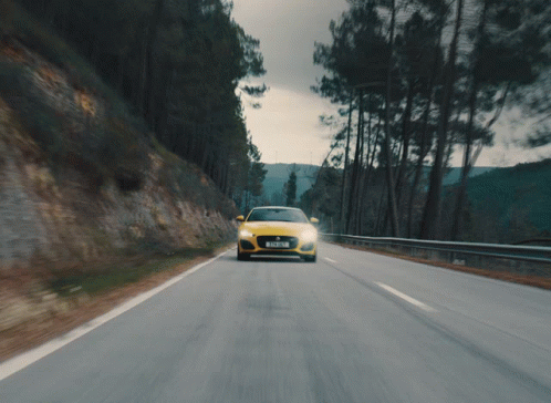 Yellow Car Driving With JCJ 912 Plate GIF