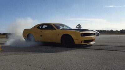 Yellow Car Driving With Smoke GIF