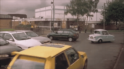 Yellow Car Parked In Parking Lot GIF