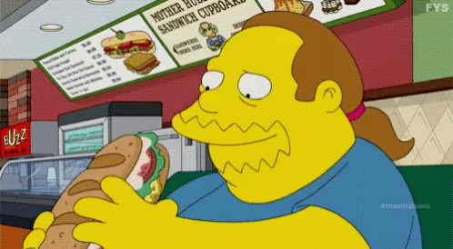 Yellow Cartoon Character Eating Sandwich GIF