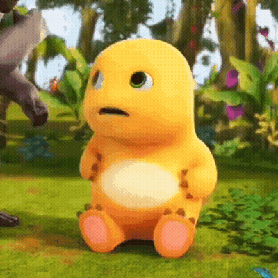 Yellow Cartoon Character Making Funny Face In Grass GIF