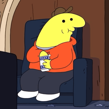 Yellow Cartoon Character Sitting In Chair Holding Bottle GIF
