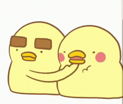 Yellow Chickens Standing Next To Each Other GIF