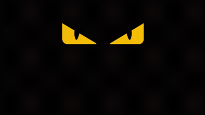 Yellow Eyes On Black Background GIF