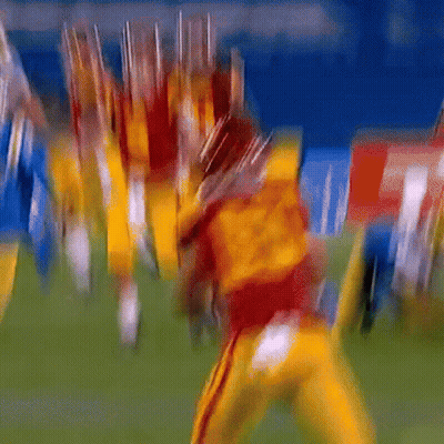 Yellow Football Player Tackled GIF